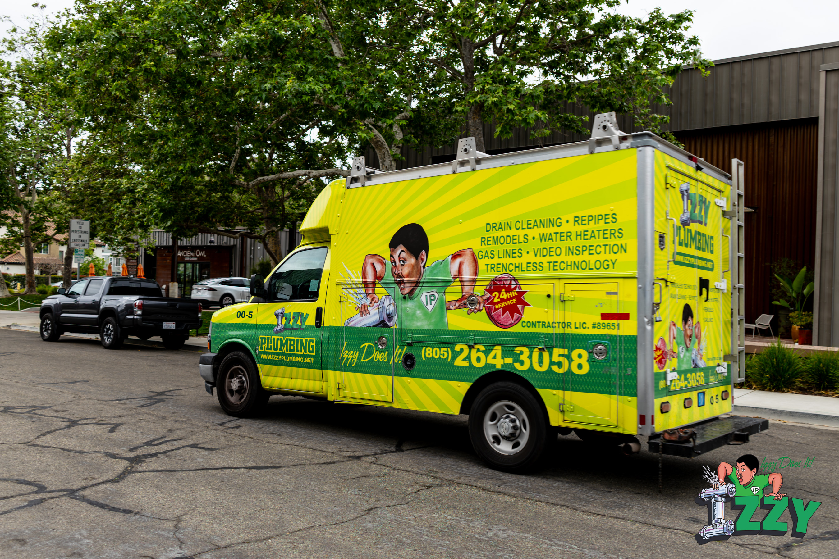 white panel van parked beside house at night — Izzy Plumbing Inc. ready to respond