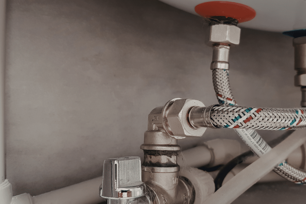 Under-sink braided water supply lines and valve