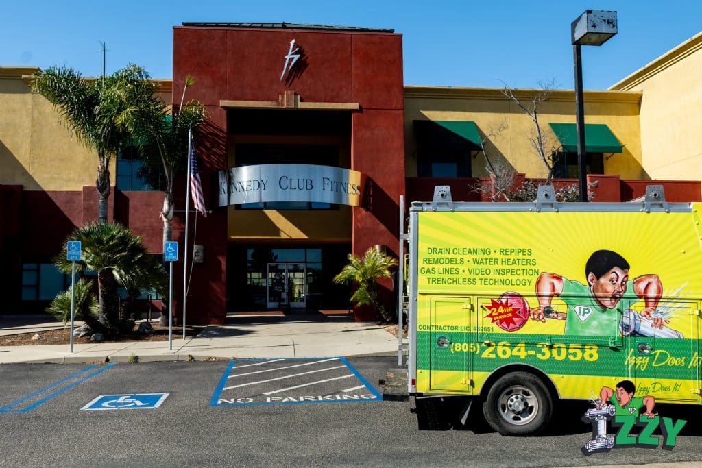 izzy truck in front of building